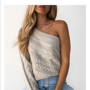 One sleeved sweater